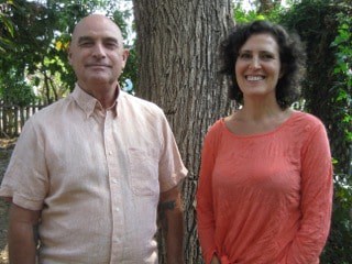 Instructors Jamie and Nick standing together outdoors at Ojai School of Canine Massage
