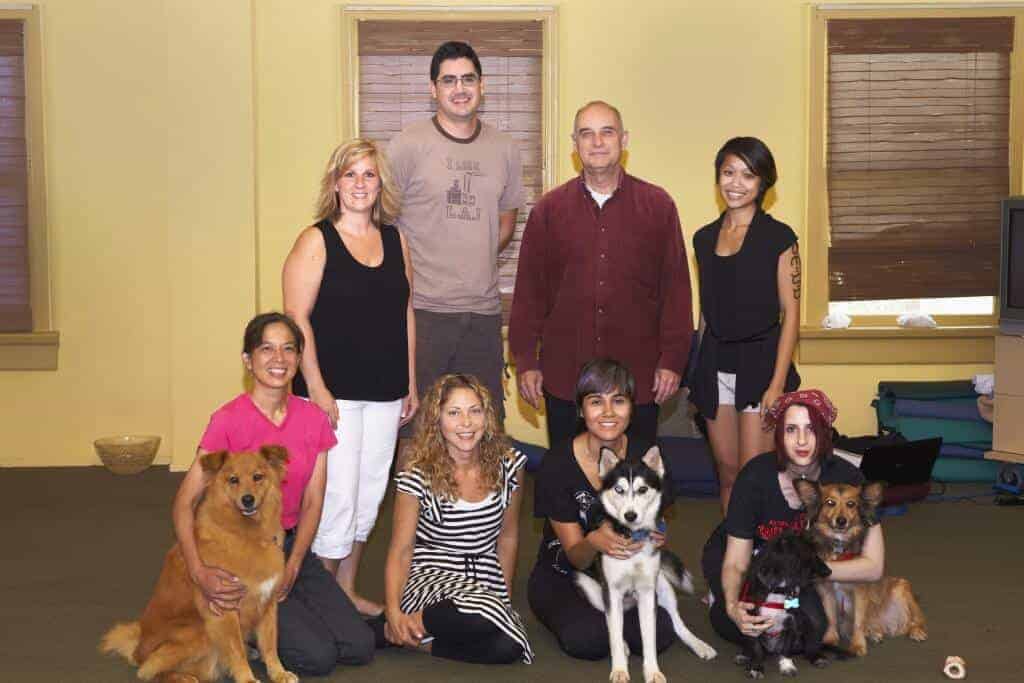 Onsite canine massage class graduates smiling together